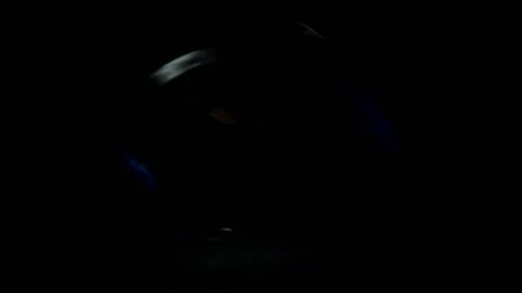 The tumble dryer starts up. Drying cycle of colored laundry close-up. Stock Footage 198309542