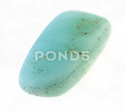 Tumbled aquamarine (blue beryl) stone on white Stock Photos