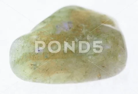 Tumbled labradorite (labrador) gemstone on white Stock Photos