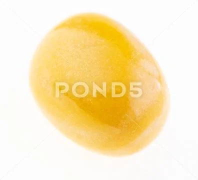 Tumbled yellow jasper stone on white Stock Photos