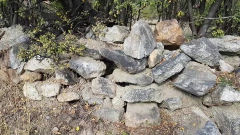 Tumbling dry stone wall Vídeos de archivo 97207141