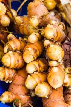 Tumeric root on display at the market Foto stock