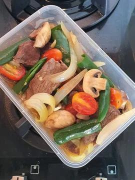 Tumis Daging Sapi Mercon or Stir fry or sauteed of beef with onion, red cay.. Stock Photos