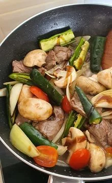 Tumis Daging Sapi Mercon or Stir fry or sauteed of beef with onion, red cay.. Stock Photos