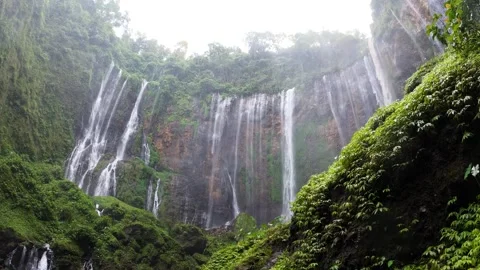 Tumpak Sewu Waterfall Java Indonesia Pan From Below Video stock 305117371