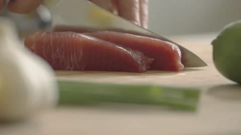Tuna being cut by knife Stock Footage 169535194