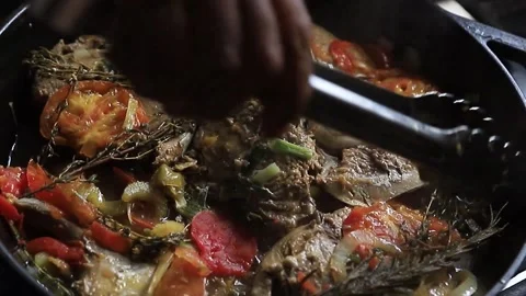Tuna fish stewed wwith tomatoes and onions Video stock 150595353