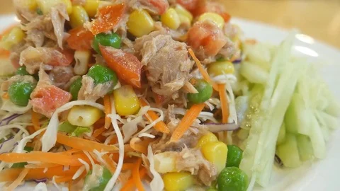 Tuna salad on white dish Stock Footage 75420132