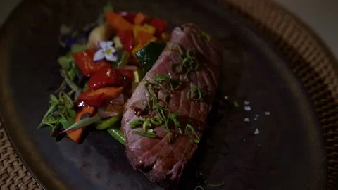 Tuna steak for dinner on table Stock Footage 261040380