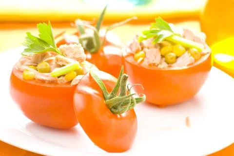 Tuna stuffed tomato celery corn soya bean Stock-Fotos
