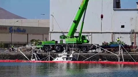 Tuna trawler sinks docked in the port of Arrecife (Lanzarote), Arrecife (Lanzaro Stock Footage 346721939