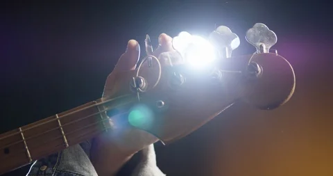 Tune guitar tuning Stock Footage 114834191