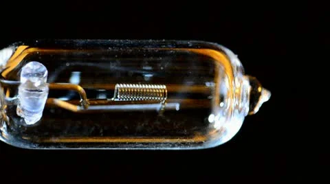 Tungsten lamp going on &amp; off (vertical) Stock Footage 10573078