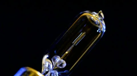 Tungsten light bulb going on &amp; off Stock Footage 10573069