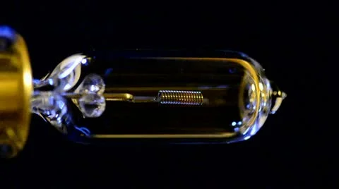 Tungsten light bulb going on &amp; off (Vertical) Stock Footage 10573073