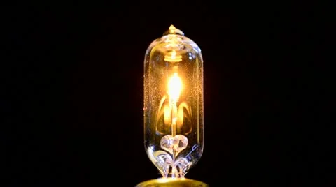 Tungsten light bulb swithcing on &amp; off Stock-Footage 10573053
