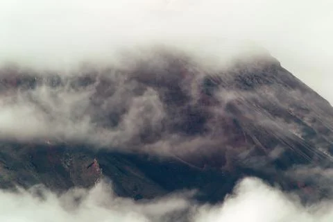 Tungurahua volcano in Ecuador captured smoking on 29 11 2010 at 4pm showcases Stock Photos