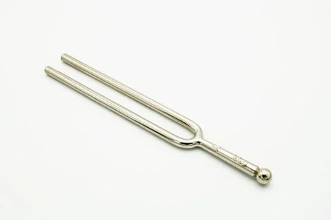 A tuning fork 440 Hz on a white background Stock Photos