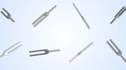 Tuning Forks Falling on a Light Blue Background. Metal Tuning Forks 3D. 4K Stock Footage 307843981