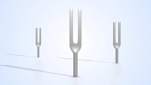 Tuning Forks on a Light Reflective Floor. Stylized Metal Tuning Forks 3D. 4K Stock Footage 307843983