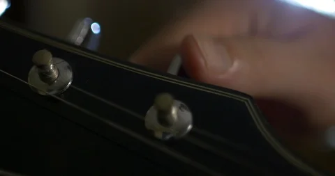 Tuning Guitar Stock Footage 89640404