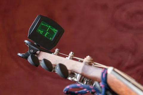 Tuning the guitar Stock Photos