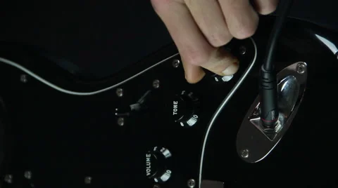 Tuning guitar volume close up 스톡 동영상 45309111