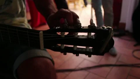 Tuning up a Spanish guitar. Stock Footage