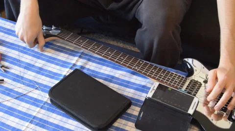 Tuning String Electric Guitar Stock Footage 66534310