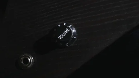 Tuning the volume knobs on an electric guitar, close-up 스톡 동영상 72750796