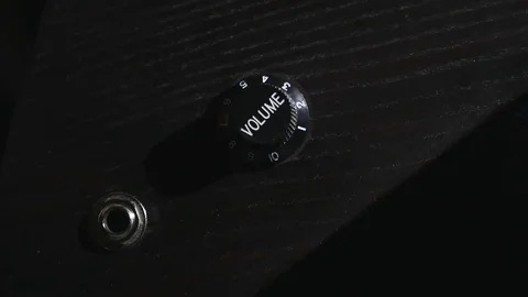 Tuning the volume knobs on an electric guitar. slow motion, close-up 스톡 동영상 72750826