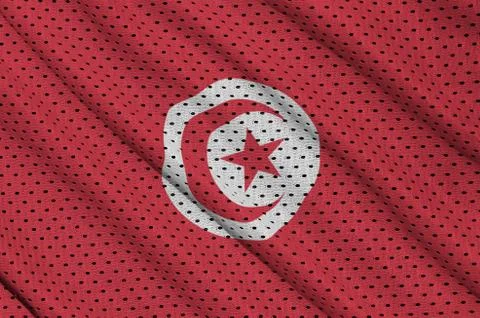 Tunisia flag printed on a polyester nylon sportswear mesh fabric Stock Photos