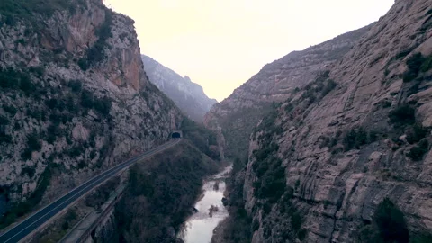 A tunnel along a river between mountains Stock Footage 270317480