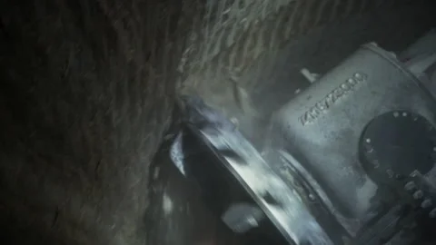 Tunnel Boring Machine working drilling mining underground Stock Footage 147236892