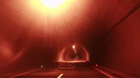 A tunnel with a car driving through it Stock Footage 273014658
