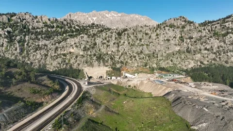 Tunnel development in the mountains aerial view 4 K Vidéo 220113311