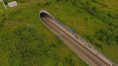 Tunnel entrance of high speed train track - aerial view Stock Footage