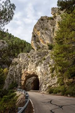 Tunnel hole at Serrania de Cuenca in Spain near Cuenca and Fuertescusa. Door  Stock Photos