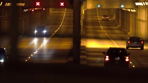 Tunnel traffic at night Stock Footage 73730640