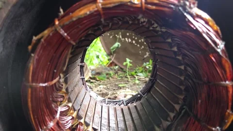 Tunnel View Through Copper Winding Stator Core of an Electric Motor Stator Housi Stock Footage 344792549