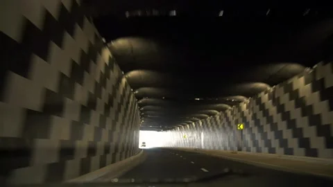 The tunnel is visible from the car window. Stock Footage 310745432