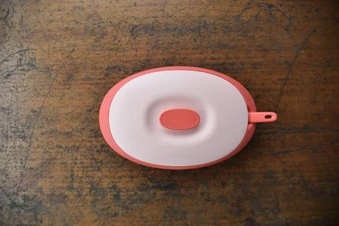 Tupperware serving set with wood table background Stock Photos