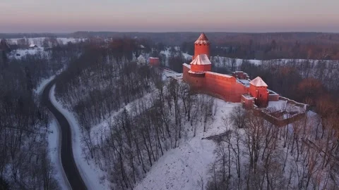 Turaida Medieval Castle in the last rays of the sun. Aerial video. Stock Footage 327809713