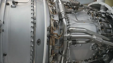 Turbine engine side view. Dismantled turbine of aircraft under repair in hangar 스톡 동영상 85644717