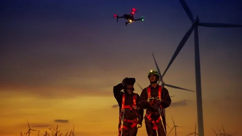 Turbine maintenance engineers are using drones to observe maintenance Stock Footage 165041597