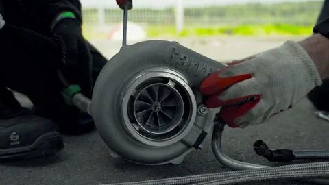 Turbine removed from the engine. Belarusian Drift Championship Stage 3 Stock Footage 205110690