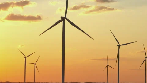 Turbines spinning during sunset 스톡 동영상 210735384