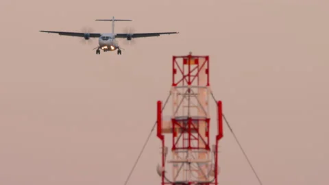 Turboprop airplane landing Stock Footage 235363852