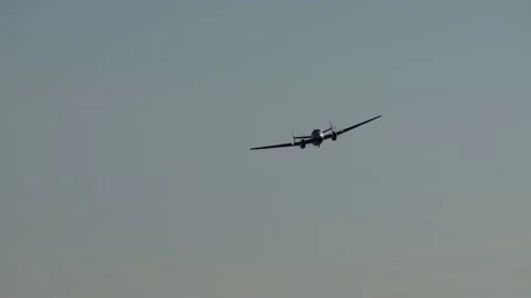 Turboprop plane flies towards. Two motors under wings. Stock Footage 220158963
