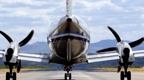 A turboprop plane taking off Stock Footage 62711529
